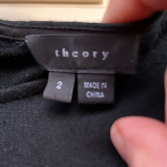 Theory black bodycon midi dress. Short sleeves, front waist valance, zipper, 2 - Picture 2 of 7